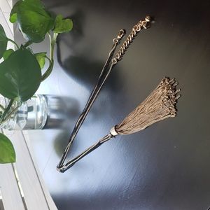 Black and gold pendant necklace